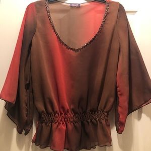 NWOT I took the tags off, moved and never wore this. Beautiful Brown & Burgundy.